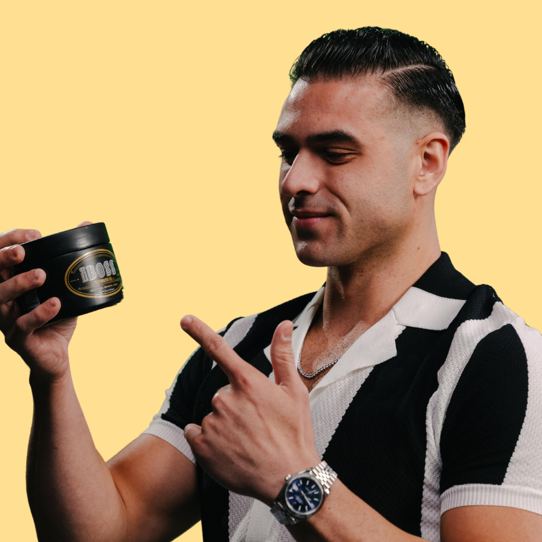 model pointing at iboss hair gel
