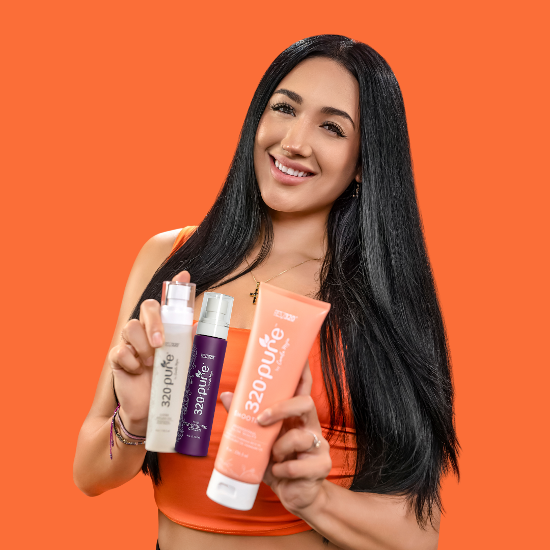 model holding 320pure vitality boost hair care trio