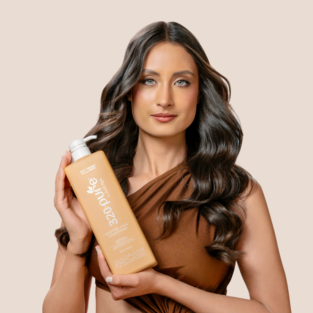 A woman holding 320 Pure moisture lock conditioner from REV-320