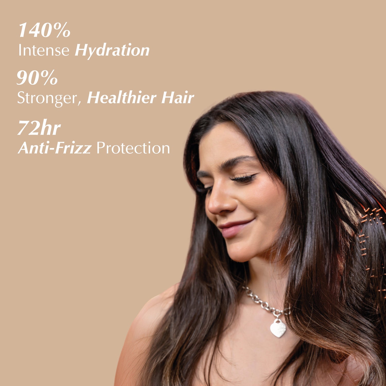 A women brushing her hair with benefits of REV-320 products