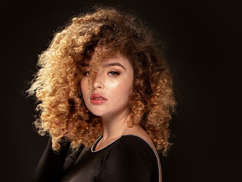 A woman with natural coily hair