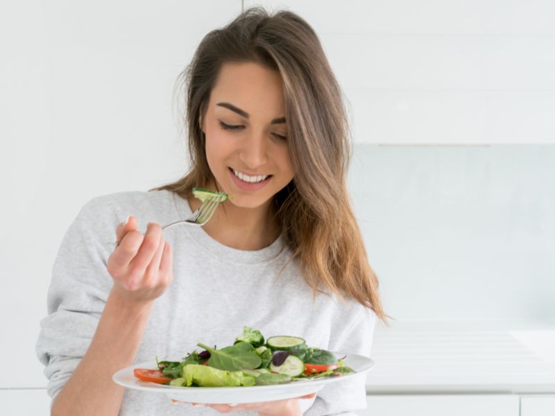 A woman eating nutritious foods