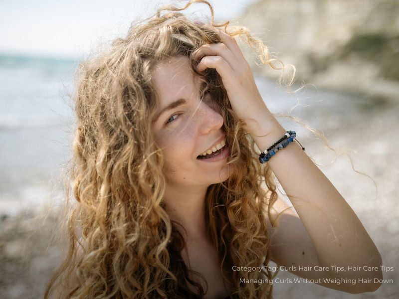 A Woman Smiling with Curl Hair