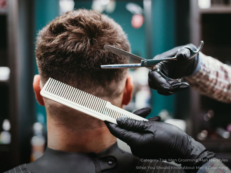 Man Getting Haircut in Barbershop