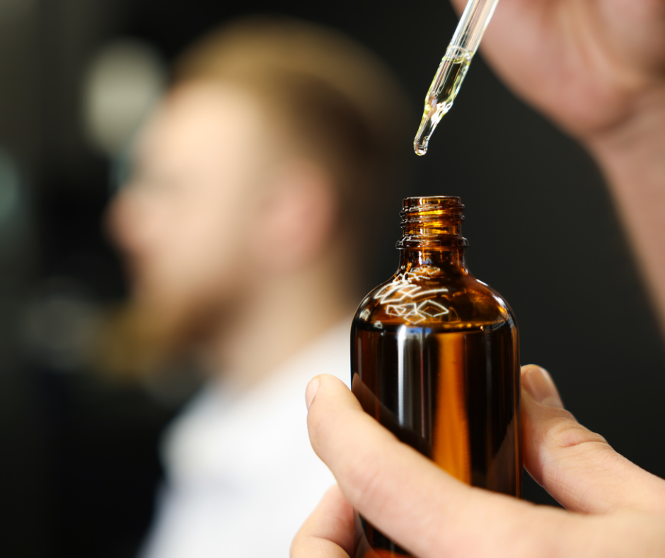 using hair oils in man's hair