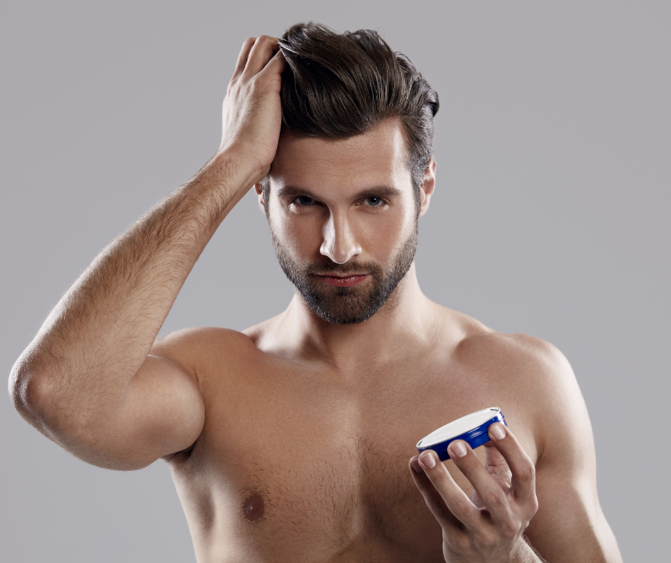 man putting hair gel on his hair