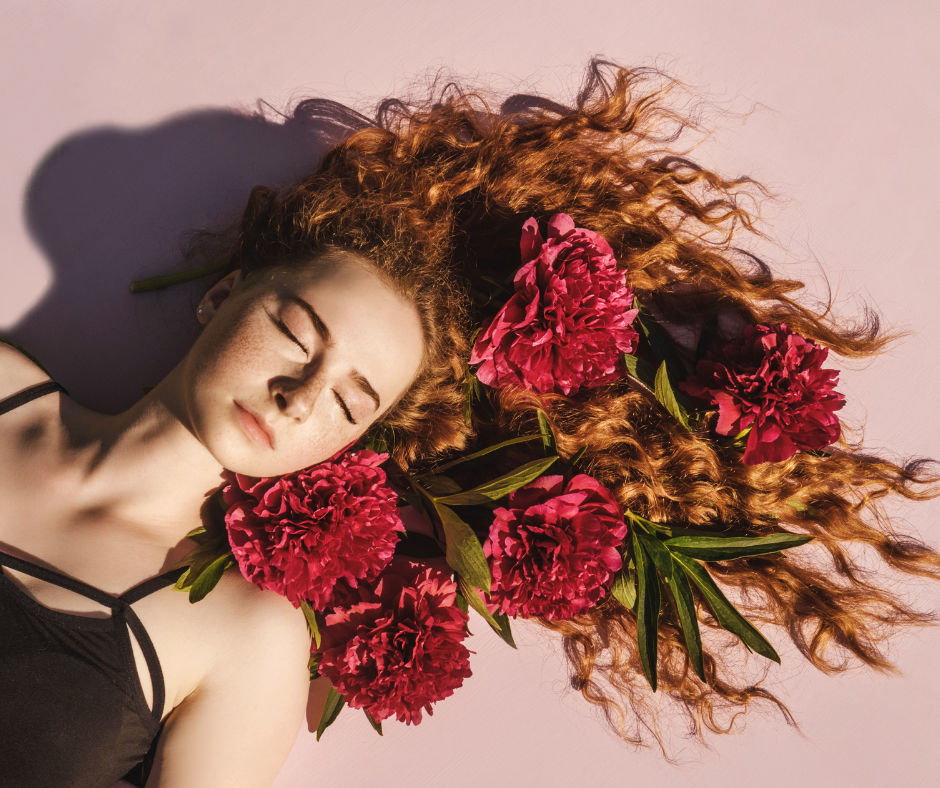 woman modeling her hair on spring day