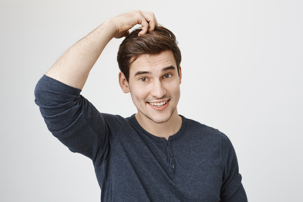 man holding his hair