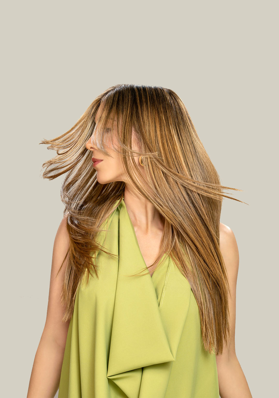 A woman with straight hair promoting Kpure hair care products