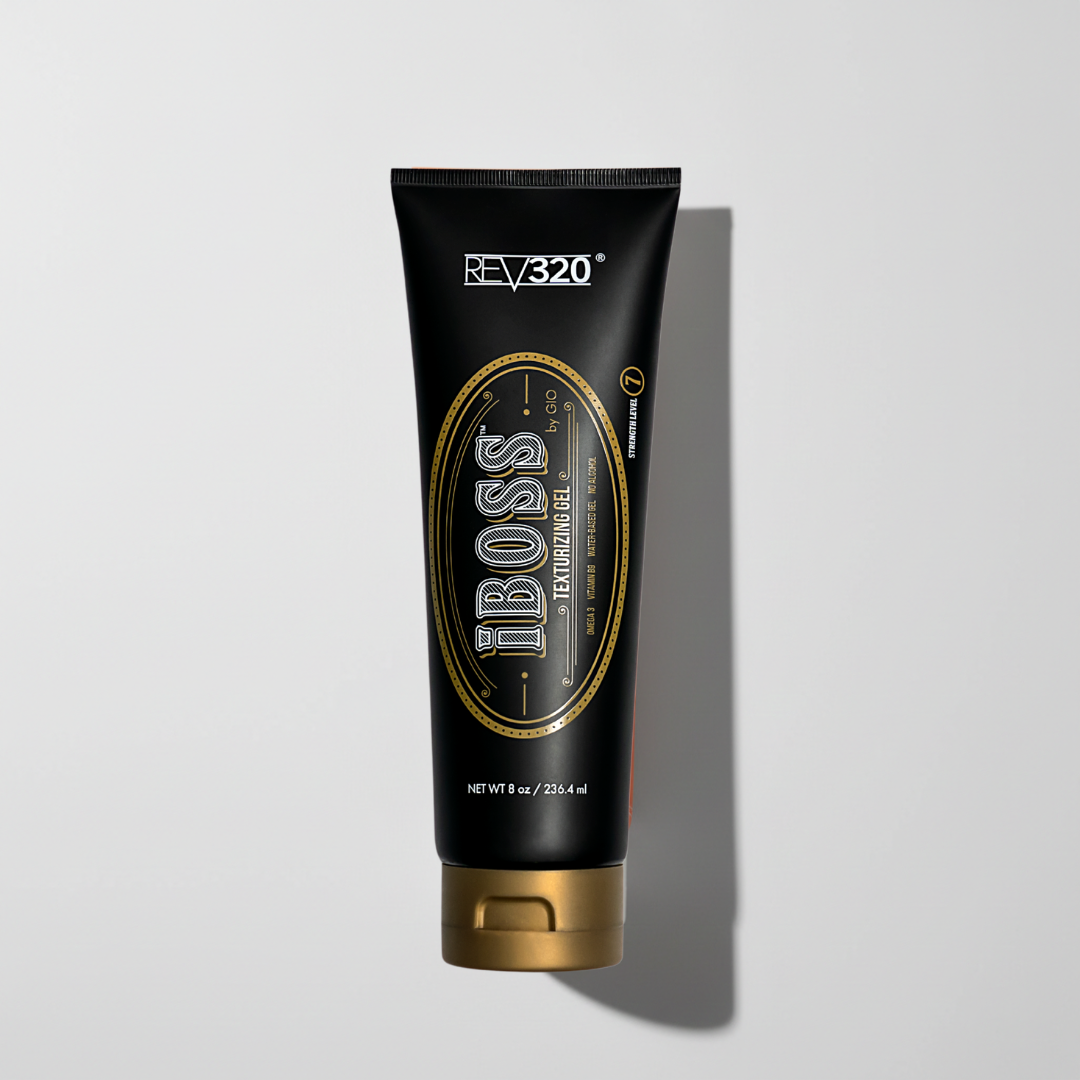 Black and gold tube of iBOSS gel by REV320 on a light gray background